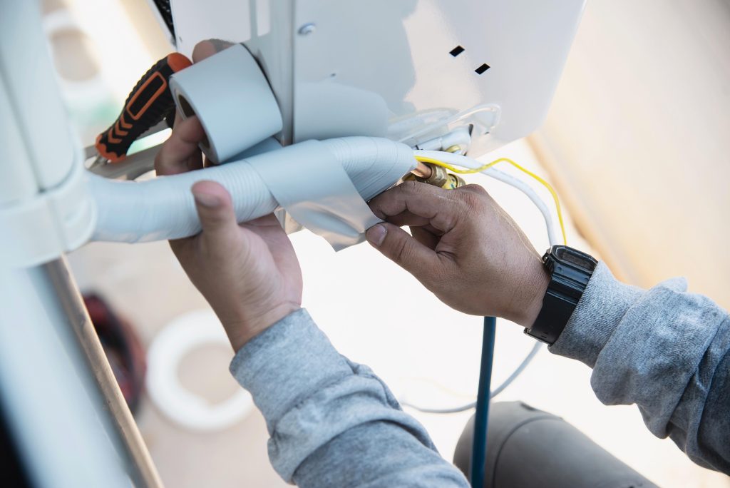 How to Diagnose and Fix Running Water Sounds in Your AC | Fix Air Conditioner Water Heater Services